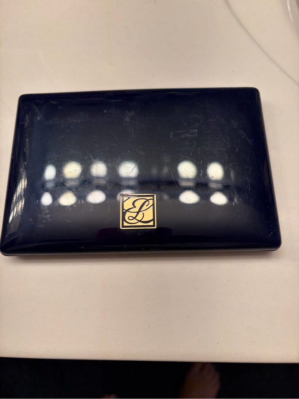 Estee Lauder Navy Compact with Gold Logo